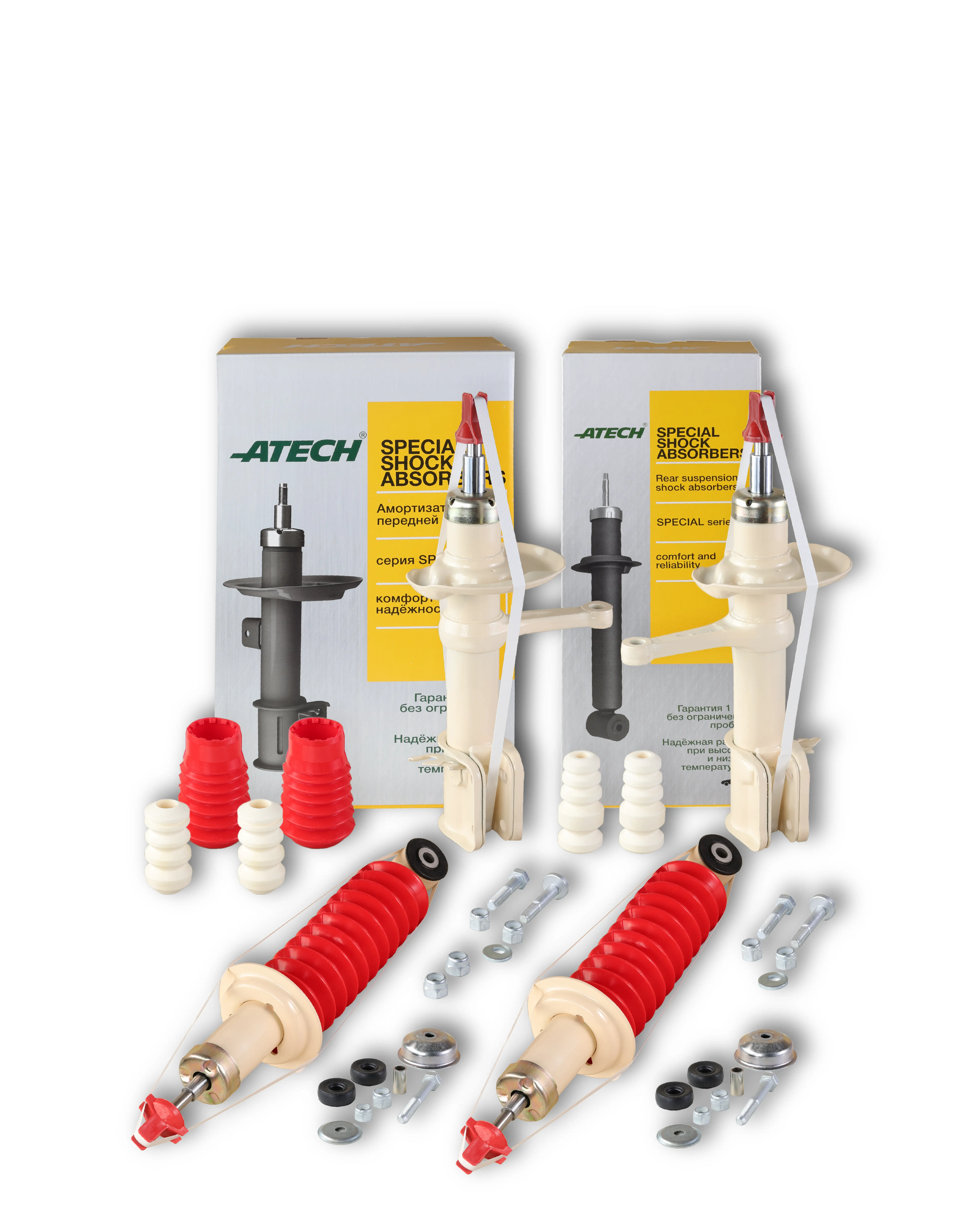 Набор автомобильных амортизаторов и комплектующих в упаковке на белом фоне.